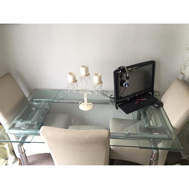 Glass extendable dining table