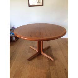 Teak extending dining table