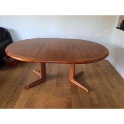 Teak extending dining table