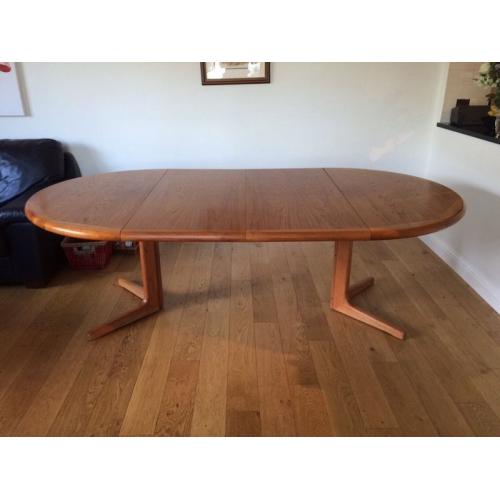 Teak extending dining table