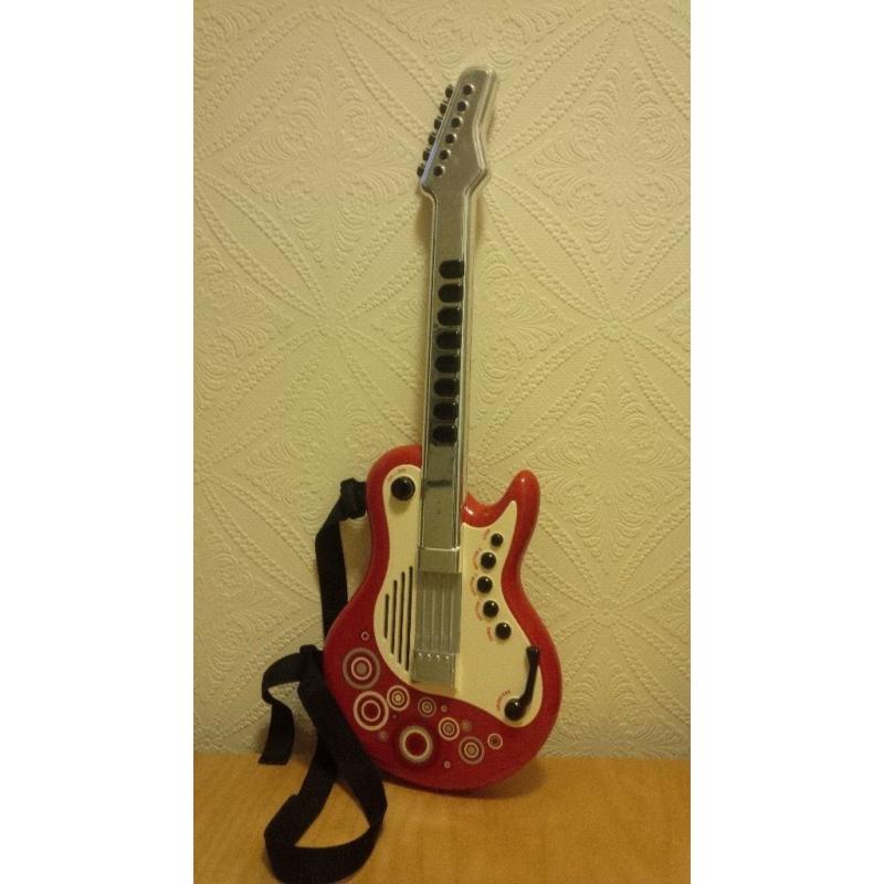 Instrument collection for children: guitar, sax, trumpet, drum, harmonica, etc.