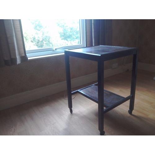 Wooden Occasional Table on castors. Circa 1950