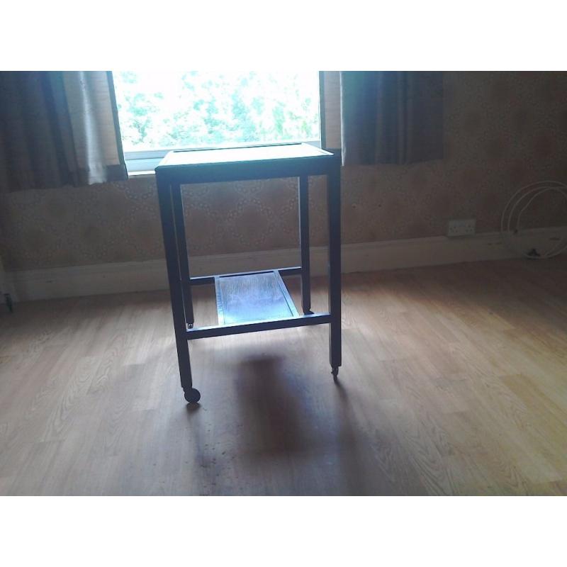 Wooden Occasional Table on castors. Circa 1950