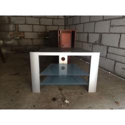 Silver debenhams tv stand with glass shelves