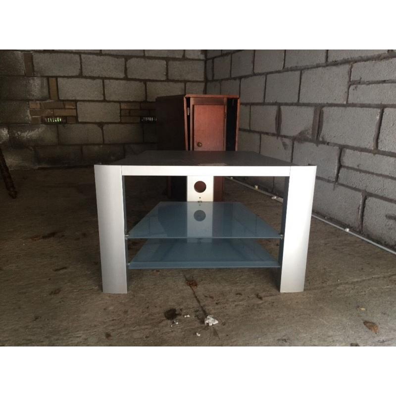 Silver debenhams tv stand with glass shelves