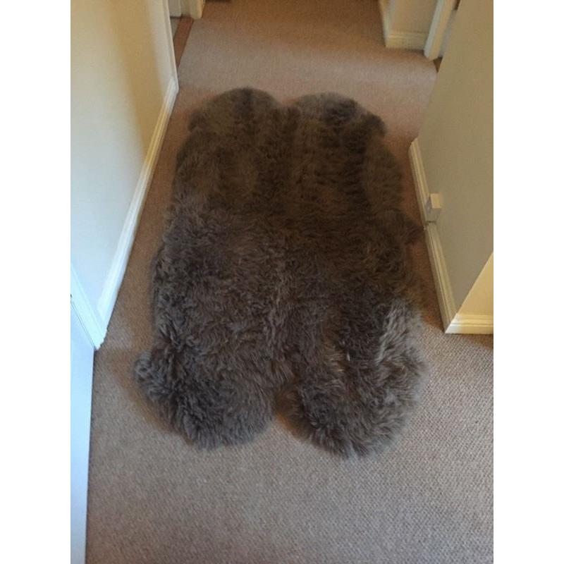 Chocolate brown large fur rug