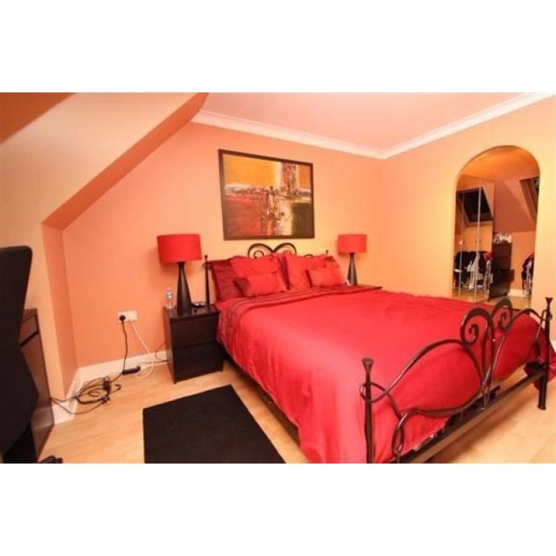 NEXT Queen sized black metal bed frame and matching under bed storage drawers