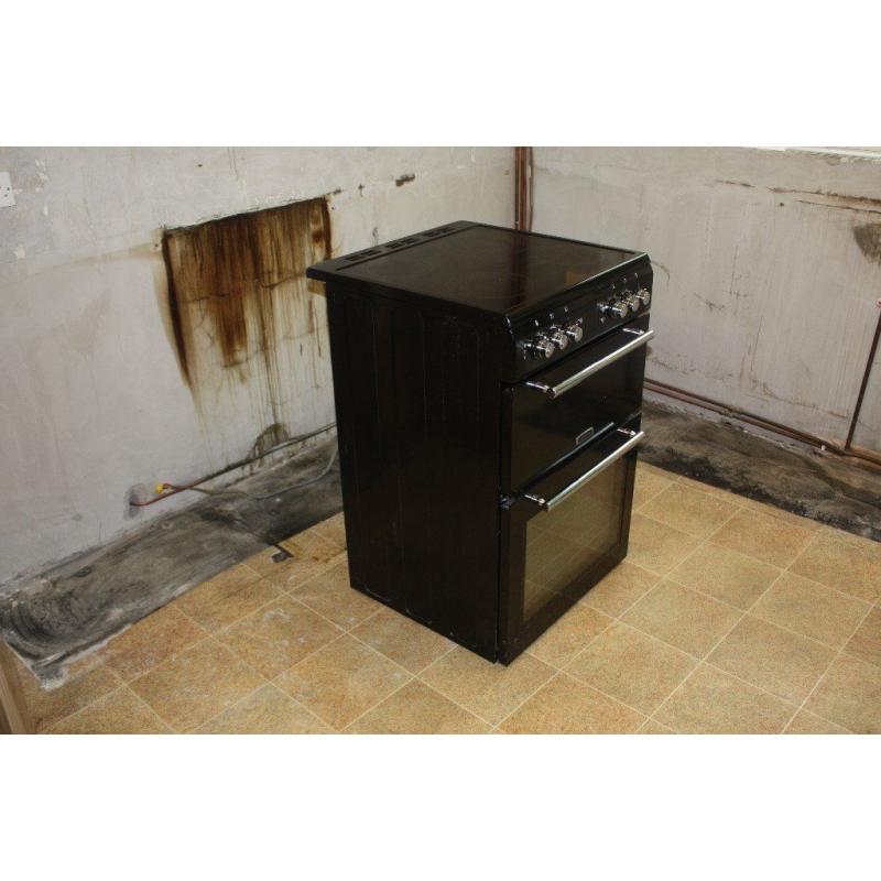Freestanding Leisure electric oven with ceramic hob. Less than 2 years old in very good condition.