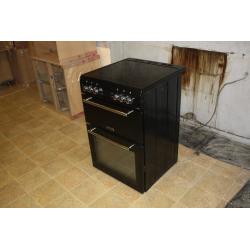 Freestanding Leisure electric oven with ceramic hob. Less than 2 years old in very good condition.