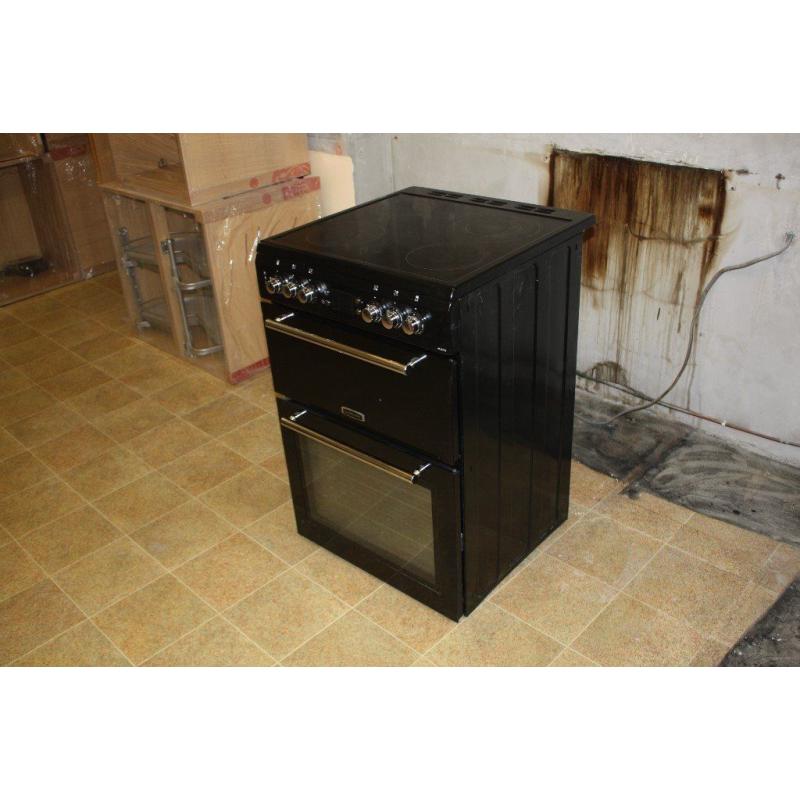 Freestanding Leisure electric oven with ceramic hob. Less than 2 years old in very good condition.