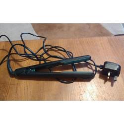 Ghd hair straighteners Mk 5.0 Black body with Teal Plates.
