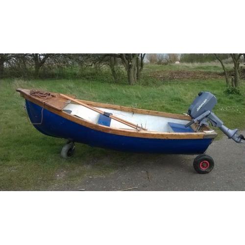 8 and a 1/2 ft Dinghy with Johnson 4HP Outboard engine