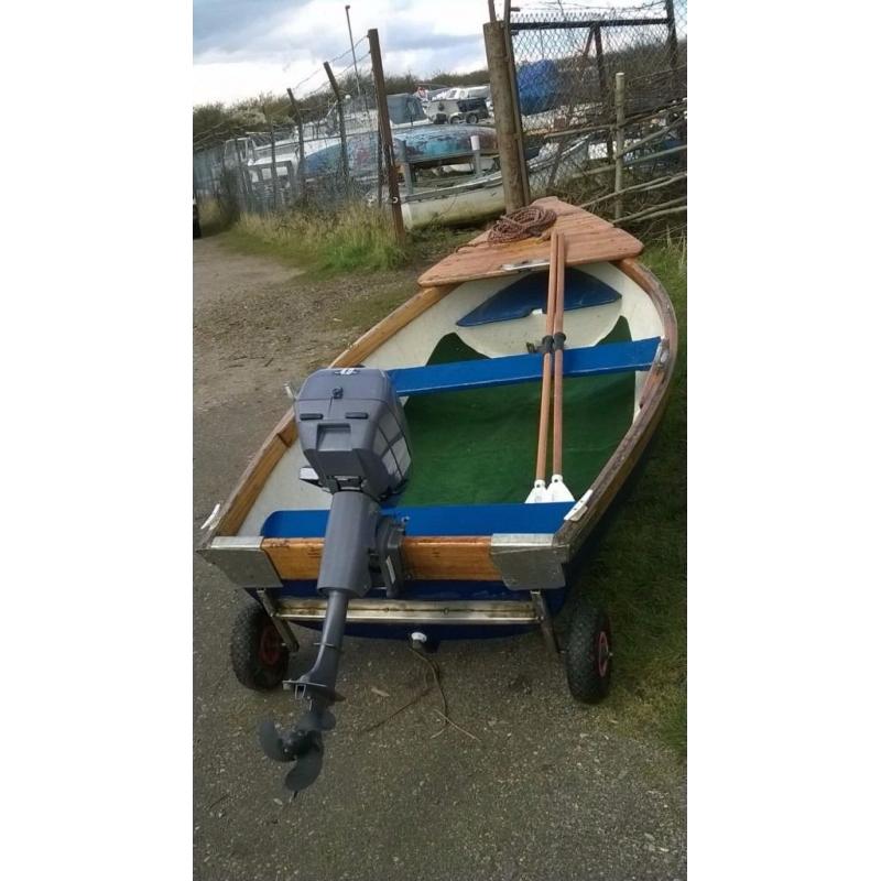 8 and a 1/2 ft Dinghy with Johnson 4HP Outboard engine