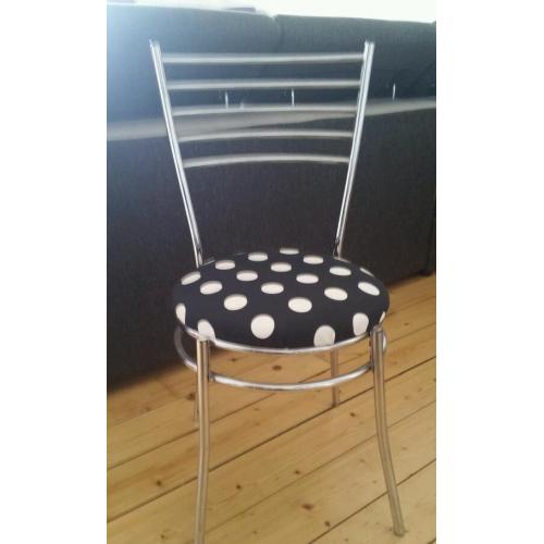 Glass dinning table and 4 chairs