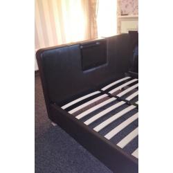 Tv bed King size brown leather bed with built in 19 inch tv good condition call or text