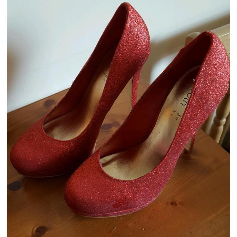 Red high heeled shoes
