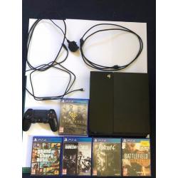 PS4 console and 5 games for sale plus a controller