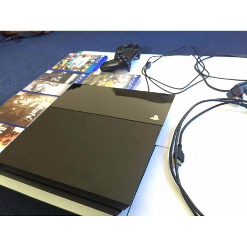 PS4 console and 5 games for sale plus a controller