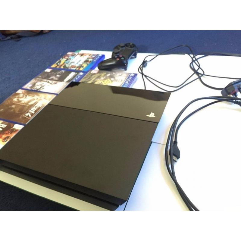 PS4 console and 5 games for sale plus a controller