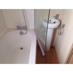 Bath, sink and shower screen in white
