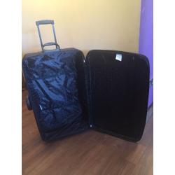 Large travel case used once, great for sharing a case between family/friends during travel!