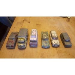 A selection of vintage old used corgi vehicles