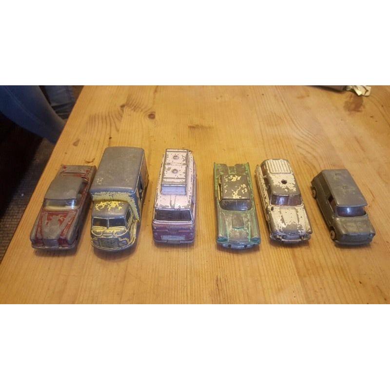 A selection of vintage old used corgi vehicles