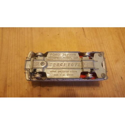 A selection of vintage old used corgi vehicles