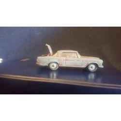 A selection of vintage old used corgi vehicles