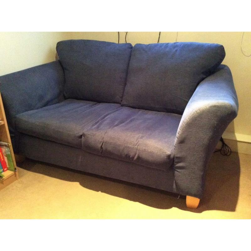 Blue two seater sofa