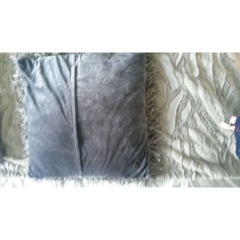 2 large sliver/grey sparkle over size cushions. 19". 2 small silver bed cushions 10".