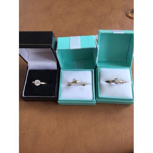 9 ct. Gold and diamond 9ct gold and opal rings and silver rings