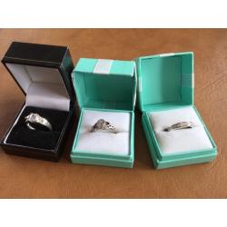 9 ct. Gold and diamond 9ct gold and opal rings and silver rings
