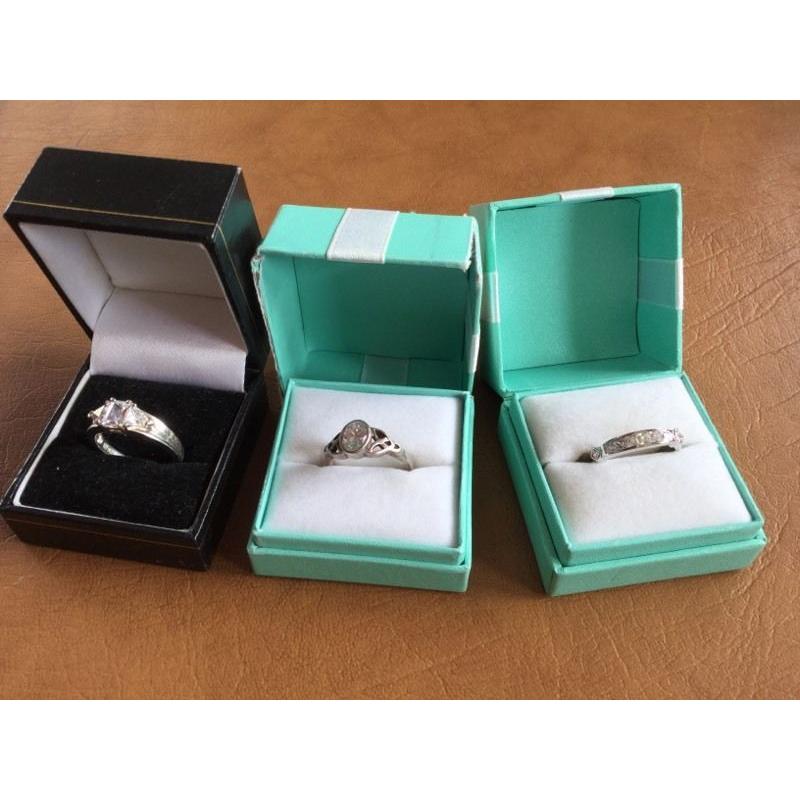9 ct. Gold and diamond 9ct gold and opal rings and silver rings