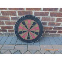 Double sided traditional dart board