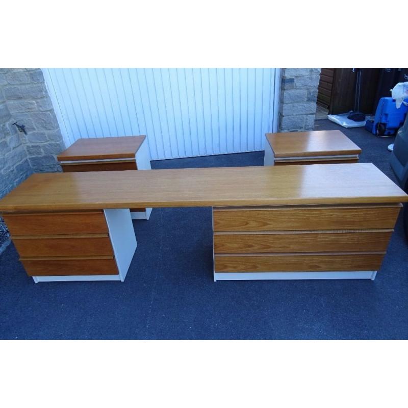 Dressing table and two matching bedside cabinets in teak and cream.