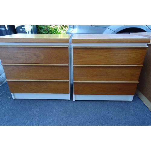 Dressing table and two matching bedside cabinets in teak and cream.