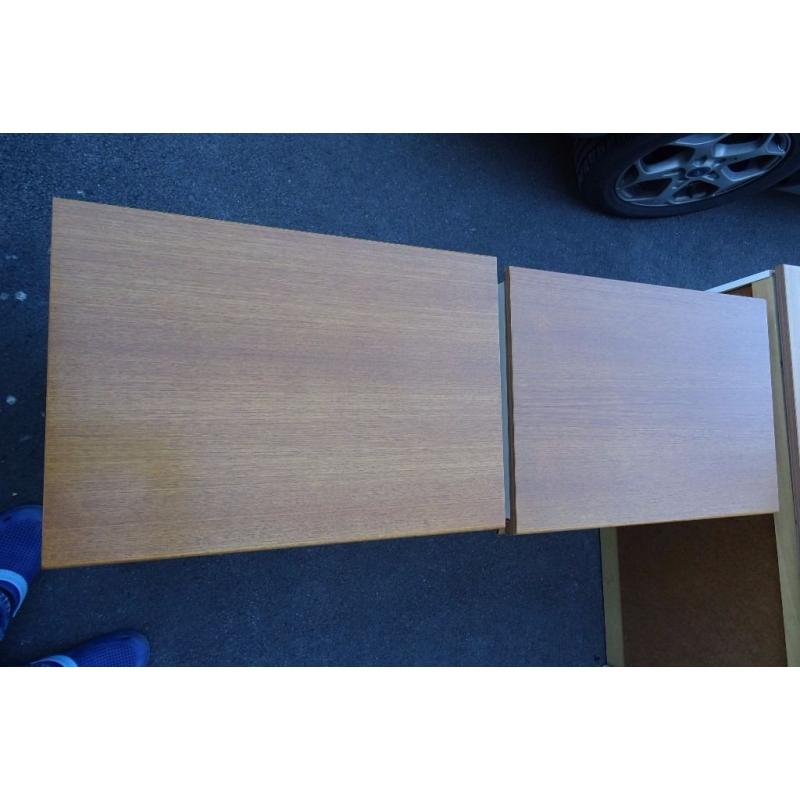 Dressing table and two matching bedside cabinets in teak and cream.