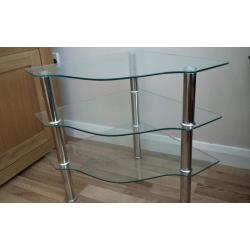 Two sets of glass corner tables