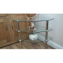 Two sets of glass corner tables