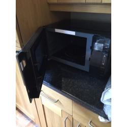 Brand New Delonghi Microwave