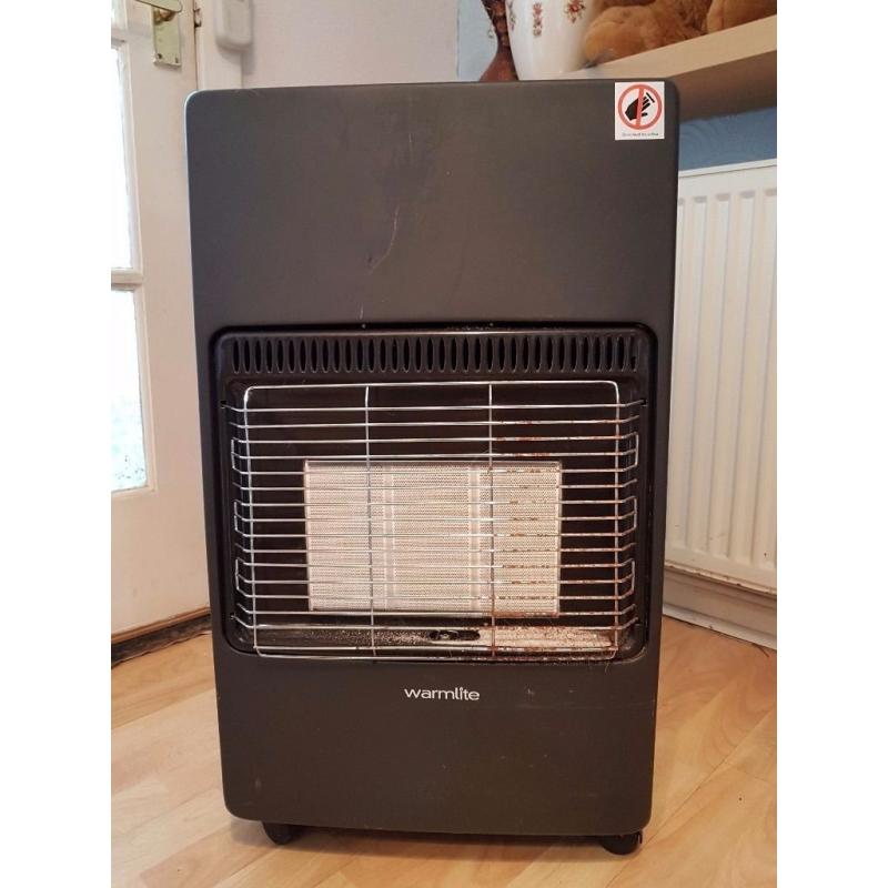 Calor gas warmlite heater hardly used and full bottle.