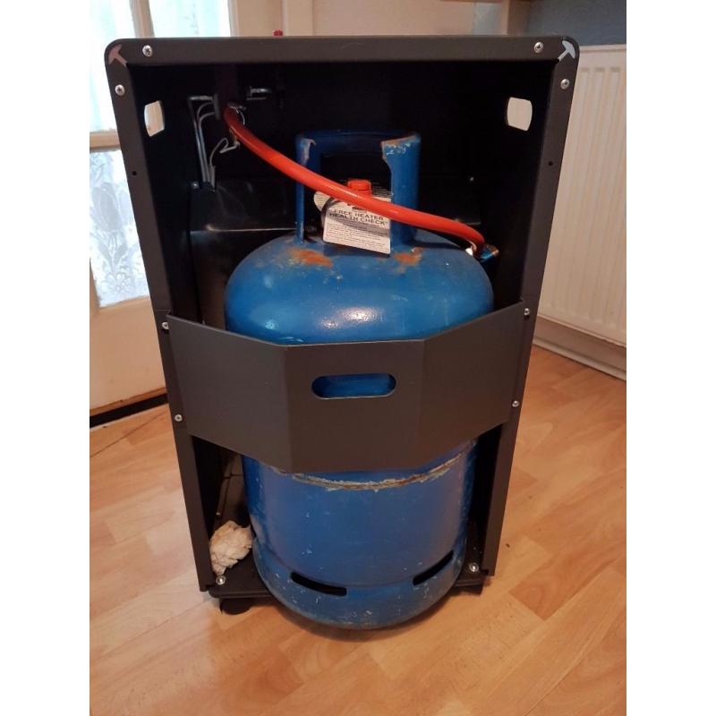 Calor gas warmlite heater hardly used and full bottle.