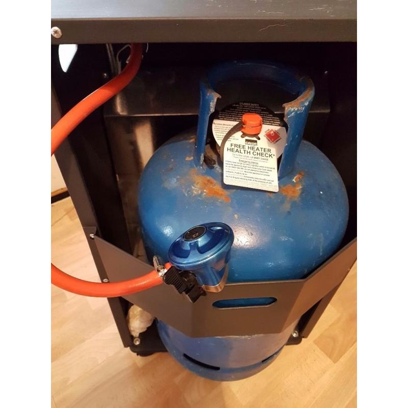 Calor gas warmlite heater hardly used and full bottle.