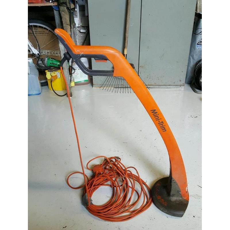 Flymo mini-trim edge trimmer.