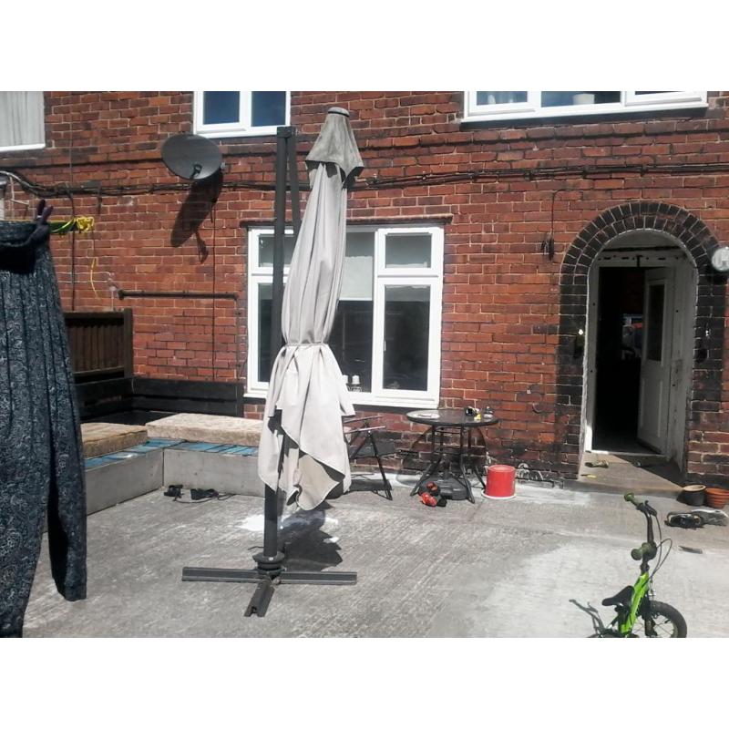 big patio umbrella bolts to the floor