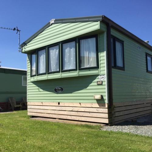 Lovely cheap static caravan holiday home for sale near lakes Morecambe North west not haven 12 month