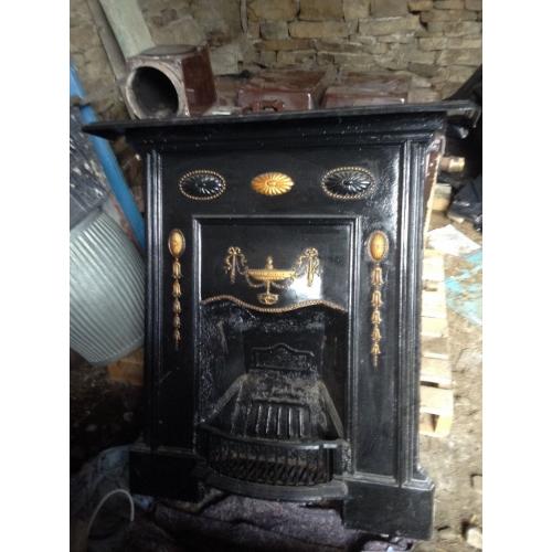 Decorative cast iron fireplace