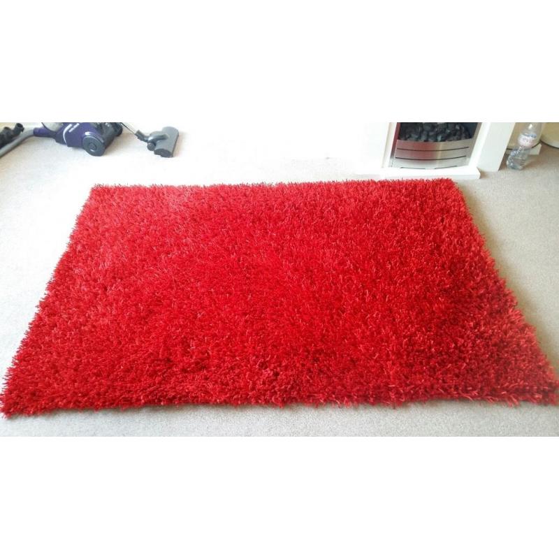 Bright Red Rug in excellent condition