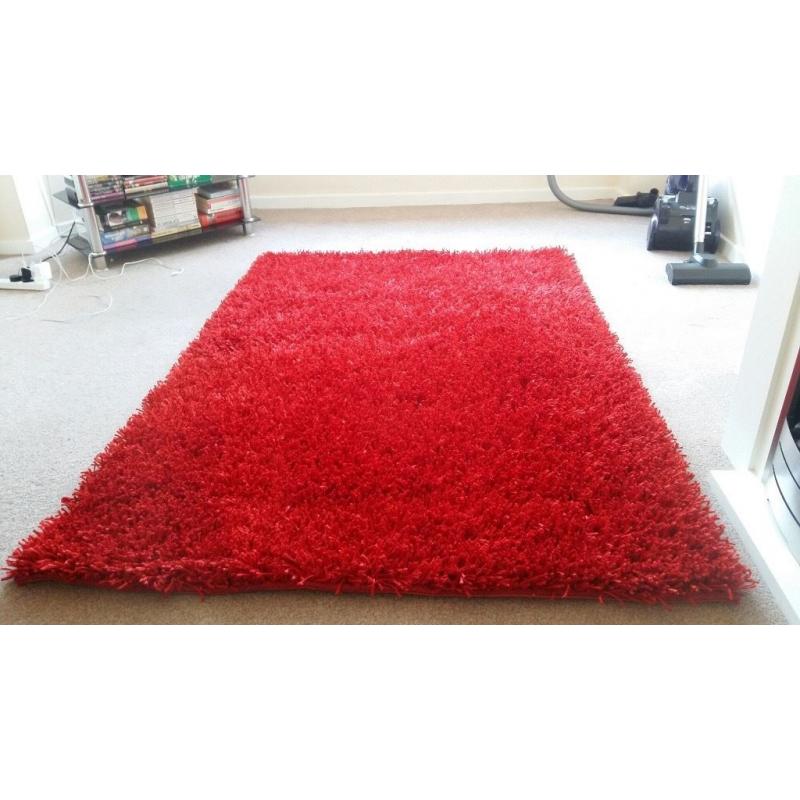 Bright Red Rug in excellent condition